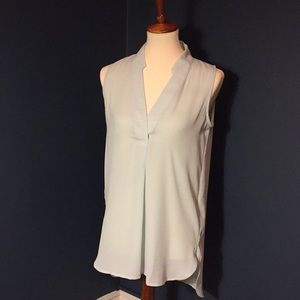 Never worn seafoam green v-neck hi-lo blouse NWT